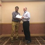 Shikha Sing receiving an award at the American Society of Agronomy, Southern Branch meeting in Jacksonville, FL