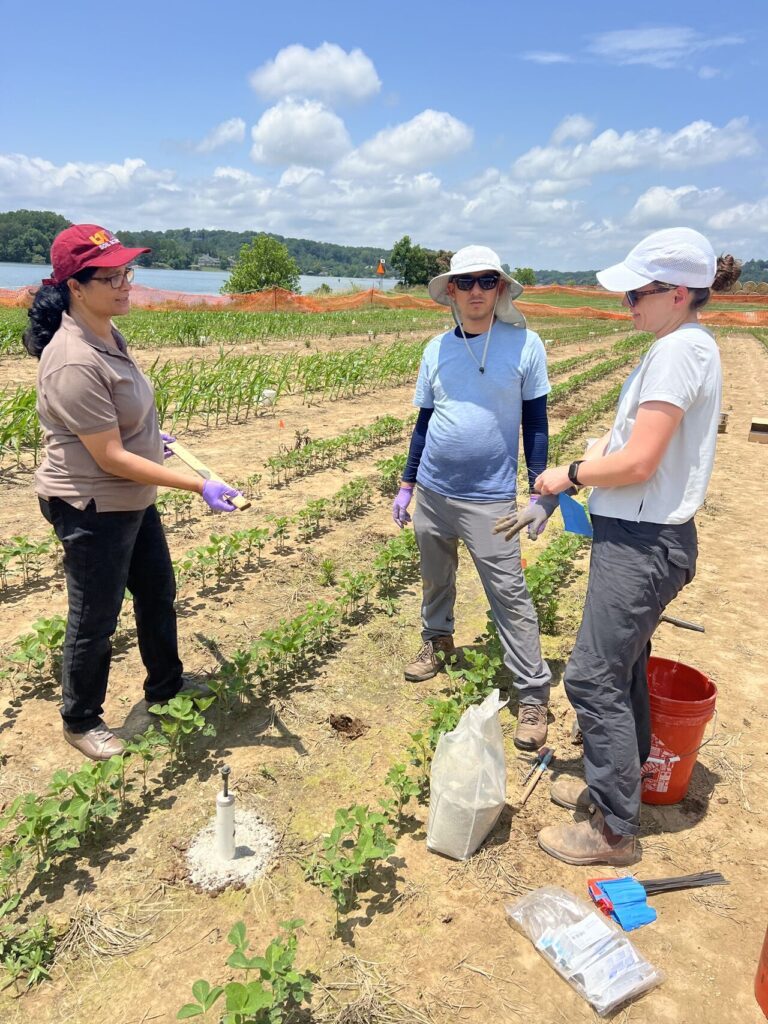This photo also presents Dr. Jagadamma, Dr. Chhetri and Dr. Wooliver installing the lysimeters in the field.