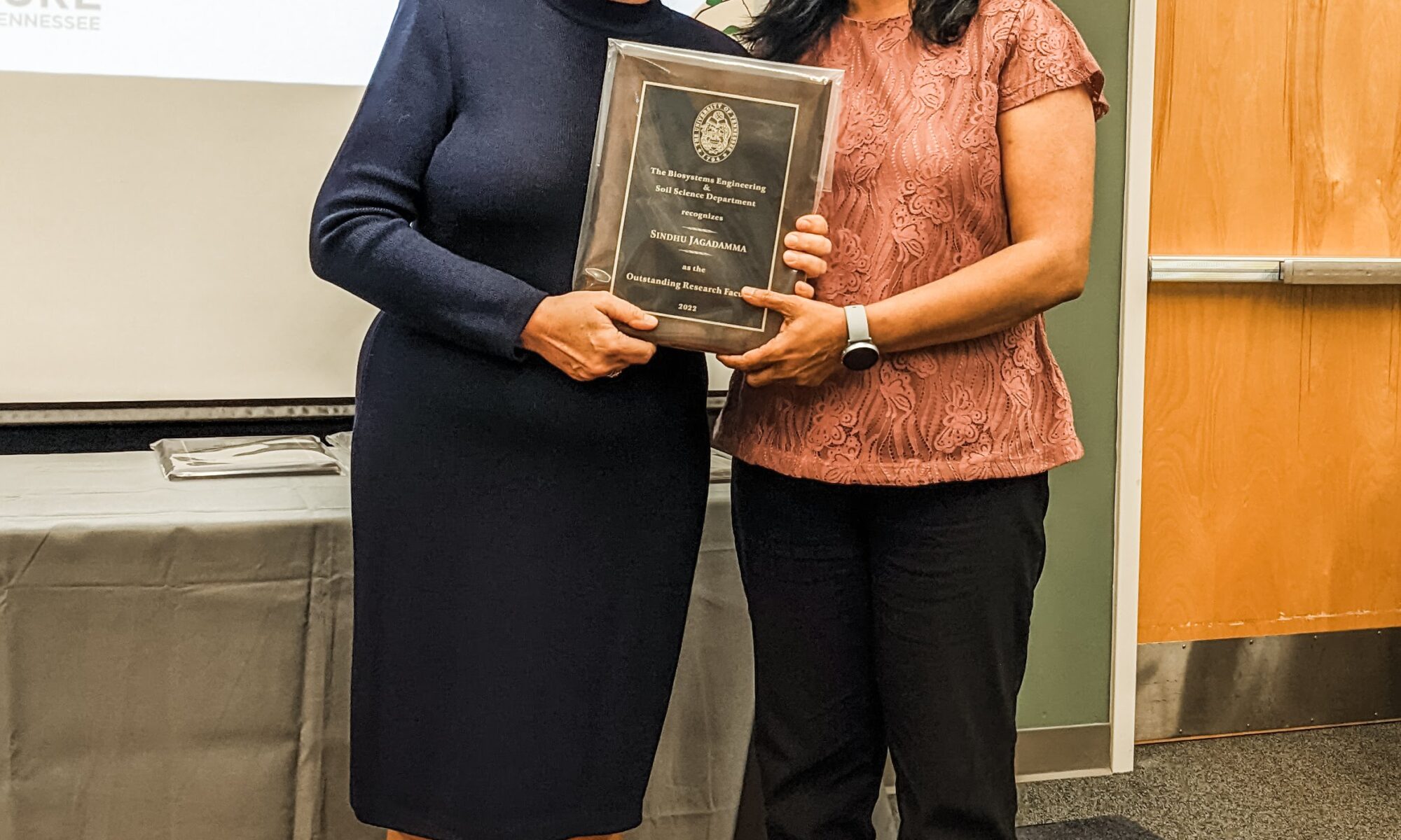 Dr. Jagadamma with her 2021-2022 Biosystems Engineering and Soil Science Outstanding Research Faculty award, pictured with Department Head Dr. Julie Carrier