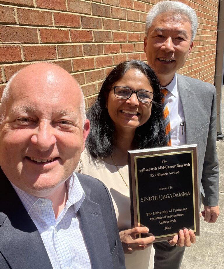 Dr. Jagadamma with her AgResearch Mid-Career Research Award pictured with UTIA Chancellor and Senior VP, Keith Carver, and UT AgResearch Dean, Hongwei Xin 