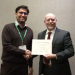 PhD student Surendra Singh receiving award for the poster competition category at the American Society of Agronomy in 2019.