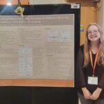 This photo features Emily Walker presenting her poster at the University of Tennessee’s annual Discovery Day