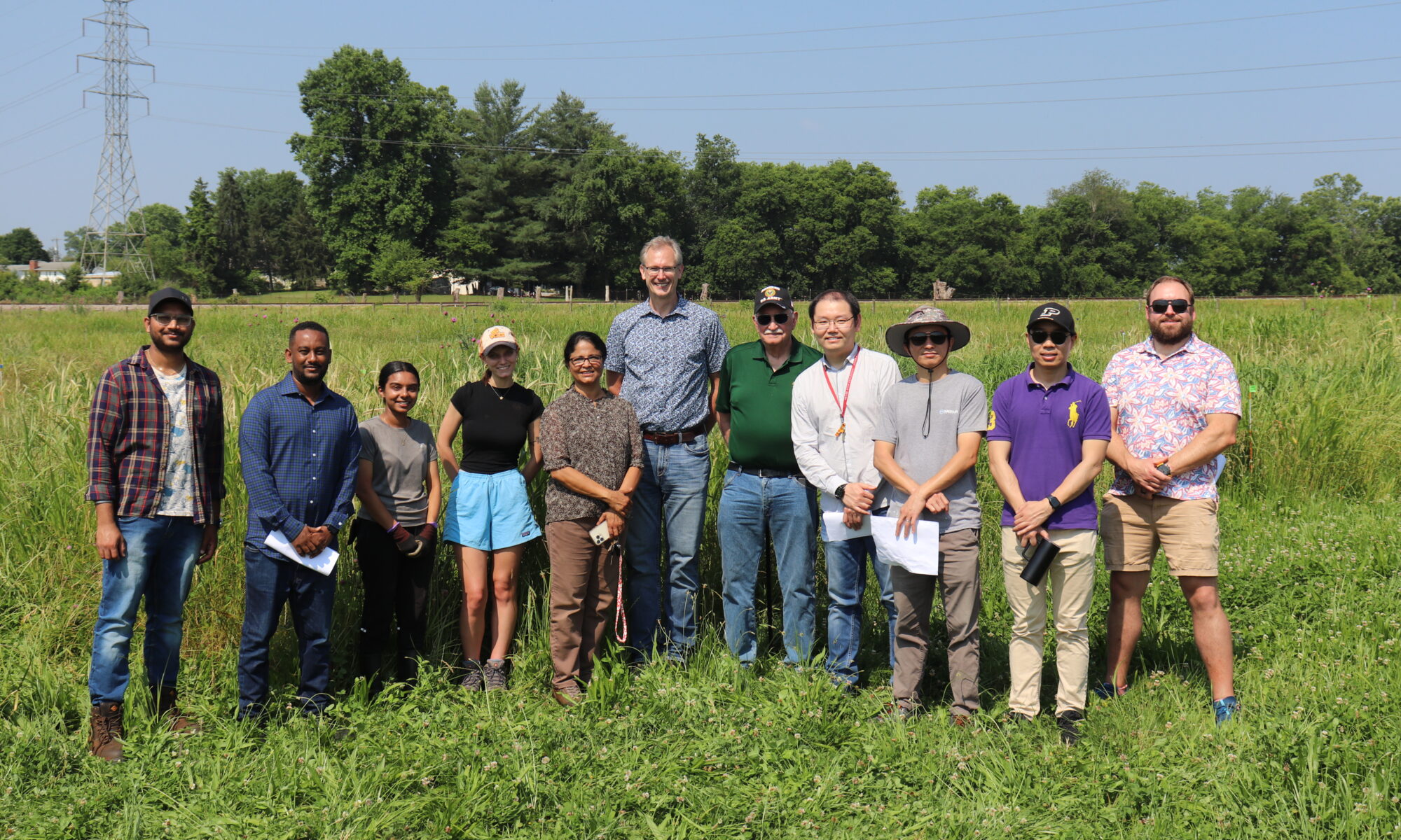 The photo features a group photo of Soil Management Lab members with the NC1178 Multi-State Project Team.