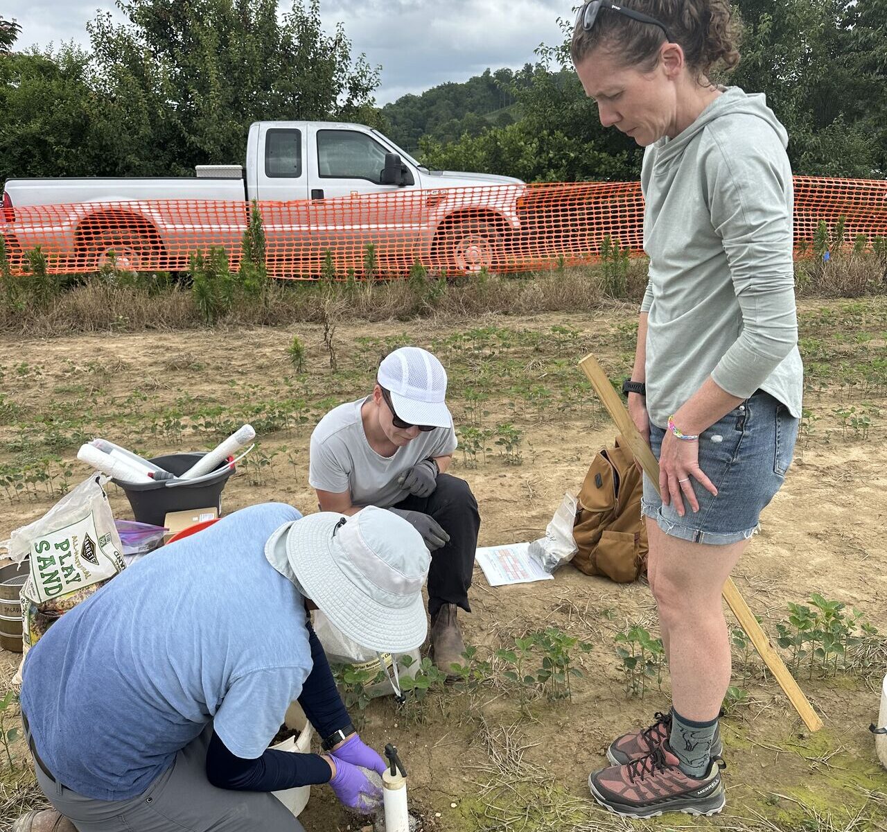 This photo features Dr. Elizabeth Herndon training the group on lysimeter installation.