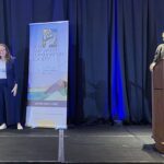 This photo presents Dr. Jagadamma receiving the 2025 Conservation Research Award from SWCS CEO Clare Lindahl